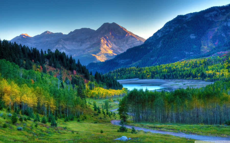 A Breathtaking View Of The Majestic Mountain Range Wallpaper