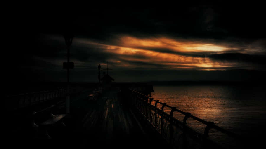 A Dark Sky Over The Water Wallpaper