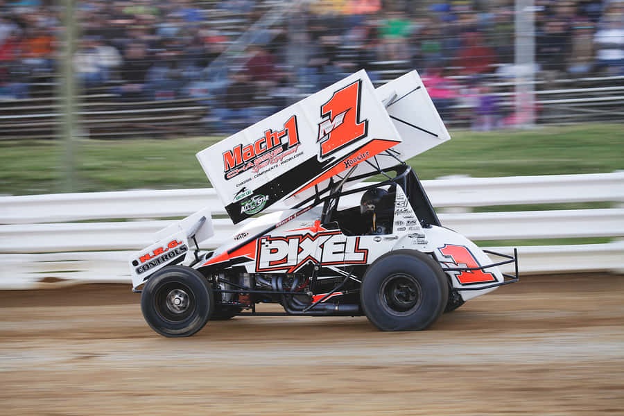 A Dirt Track With A Dirt Car Wallpaper