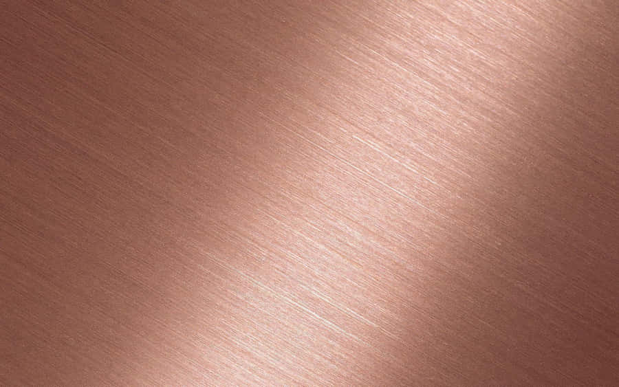 A Golden Hue Of Rose Gold Adds A Touch Of Luxury To Any Space Wallpaper