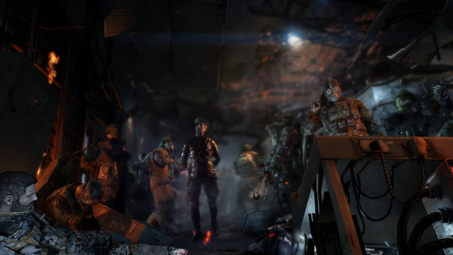 A Group Of People In A Dark Room Wallpaper