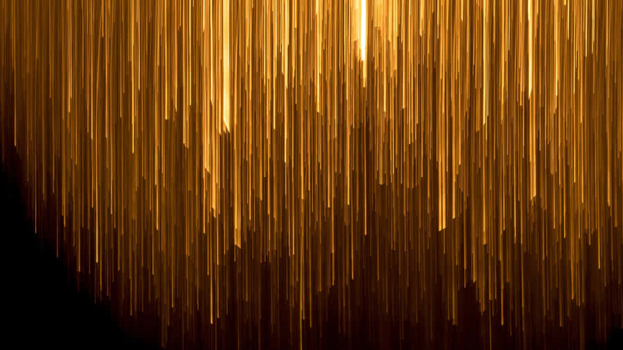 A Luxurious Black And Gold Desktop With A Sleek Design Wallpaper