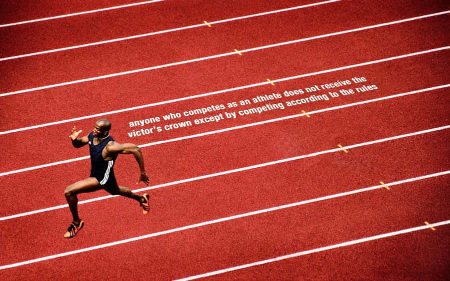 A Man Running On A Track Wallpaper