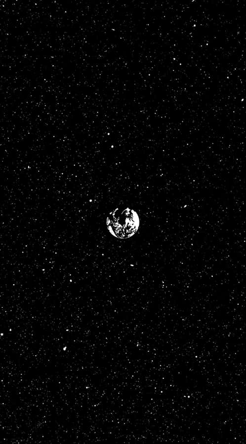 A Mesmerizing Black And White Star In The Night Sky Wallpaper