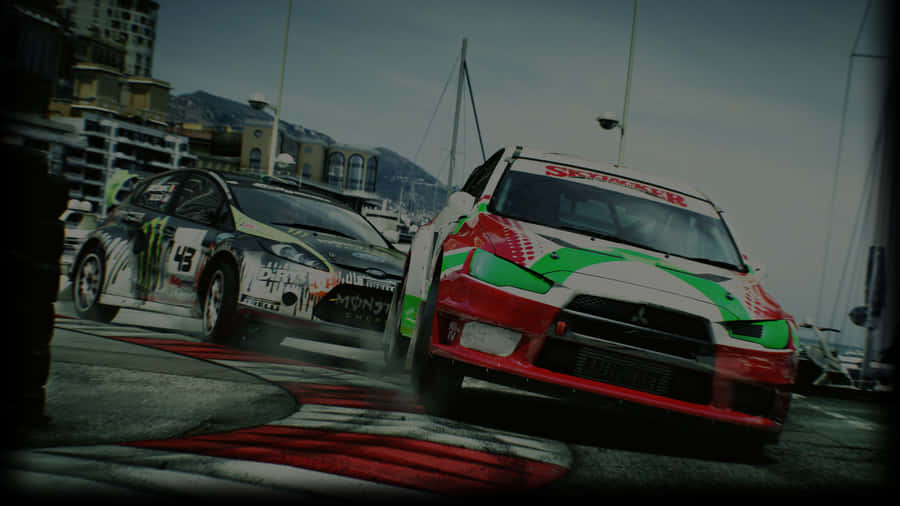 A Race Car Driving On A Track Wallpaper