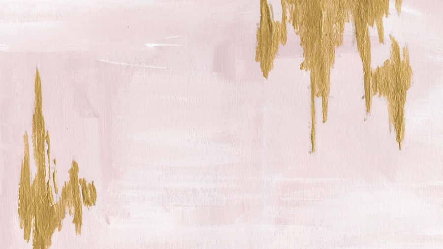 A Rose Gold Laptop On The Desk Of A Busy Professional Wallpaper