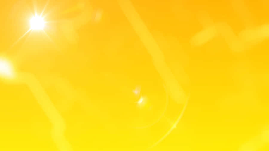 A Sleek Pastel Yellow Laptop Wallpaper