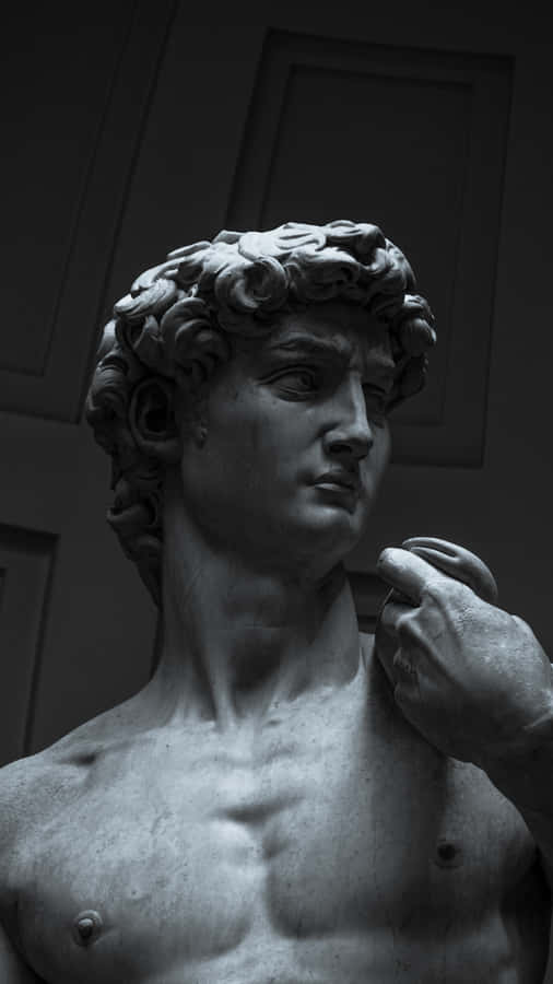 A Statue Of A Man Wallpaper