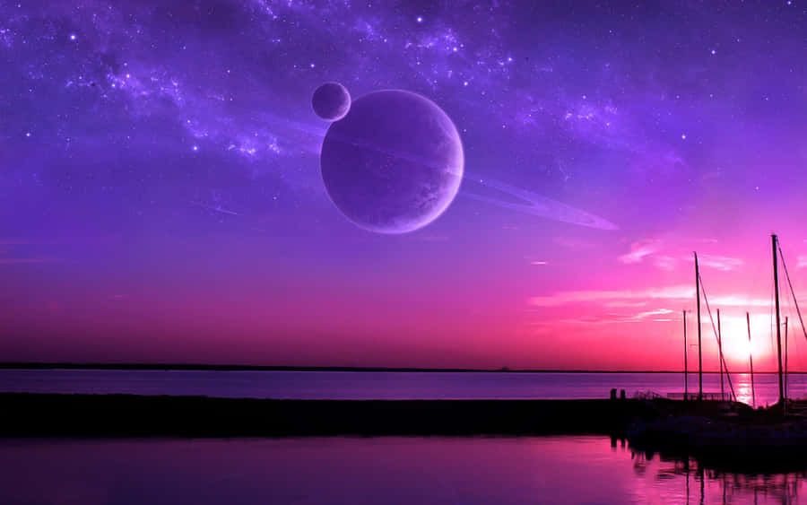 A Stunning Landscape With A Blue, Purple And Orange Sunset Wallpaper