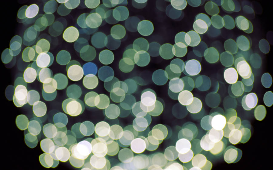 A Vibrant Green Orb With A Delightful Aesthetic Wallpaper