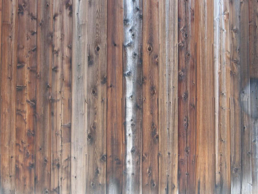 A View Of Weathered Barn Wood Planks Wallpaper