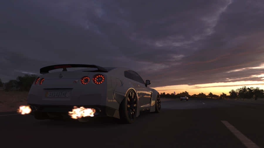 A White Car With Smoke Coming Out Of It Wallpaper
