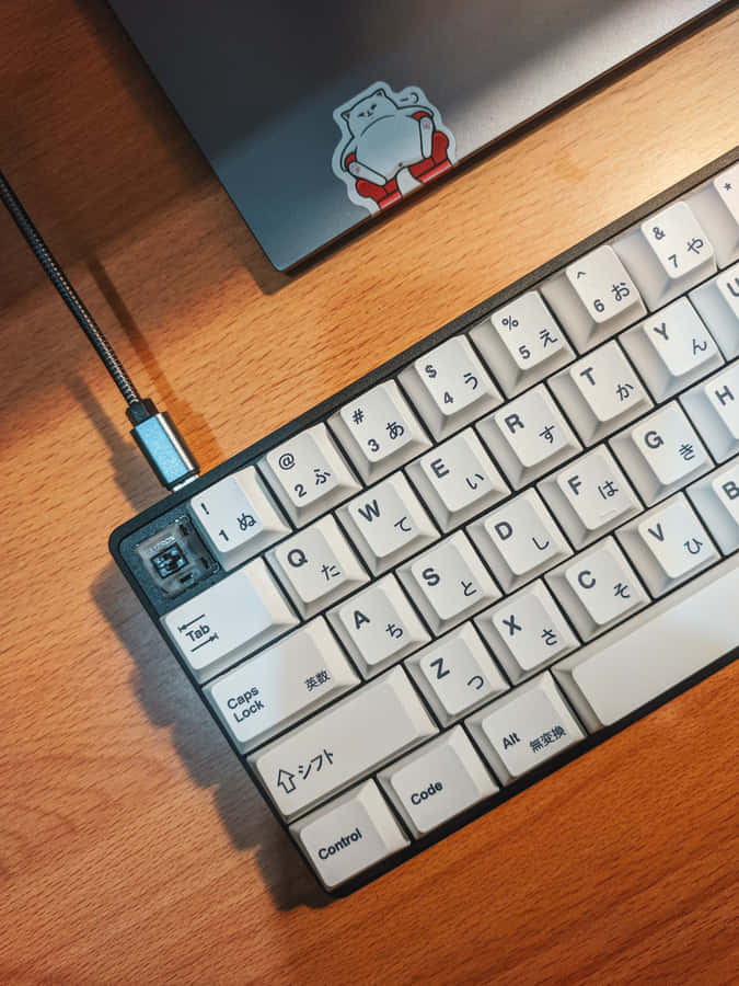 A White Keyboard With A Mouse On It Wallpaper