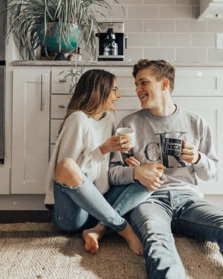 Adorable Couple In Love Enjoying Their Time Together Wallpaper