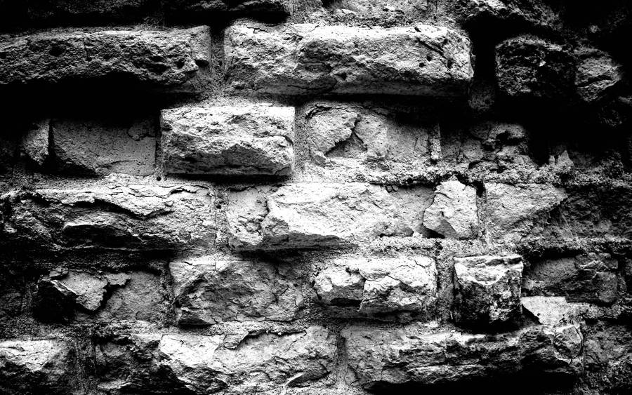 Architectural Brilliance In Black Brick Building Wallpaper