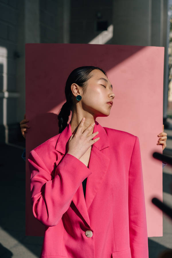 Asian Woman In Stylish Red Suit Wallpaper