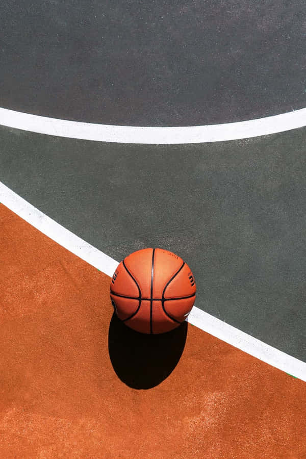 Basketball Aesthetic Ball On Court Floor Wallpaper