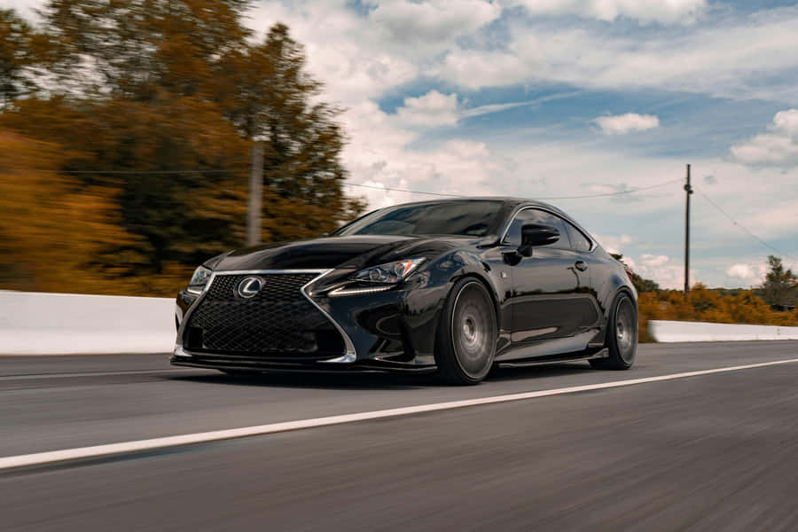 Black Lexus R C F Speedingon Highway Wallpaper