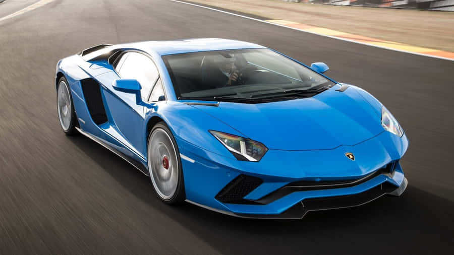 Blue Lamborghini Aventador Action Sports Wallpaper