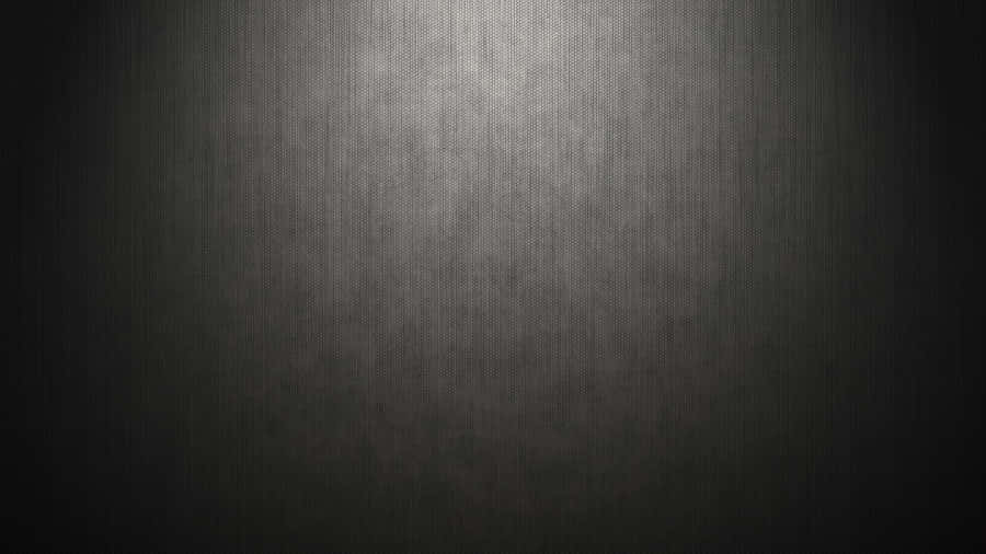 Brighten Your Life With A Glossy And Shimmery Black Metallic Background Wallpaper