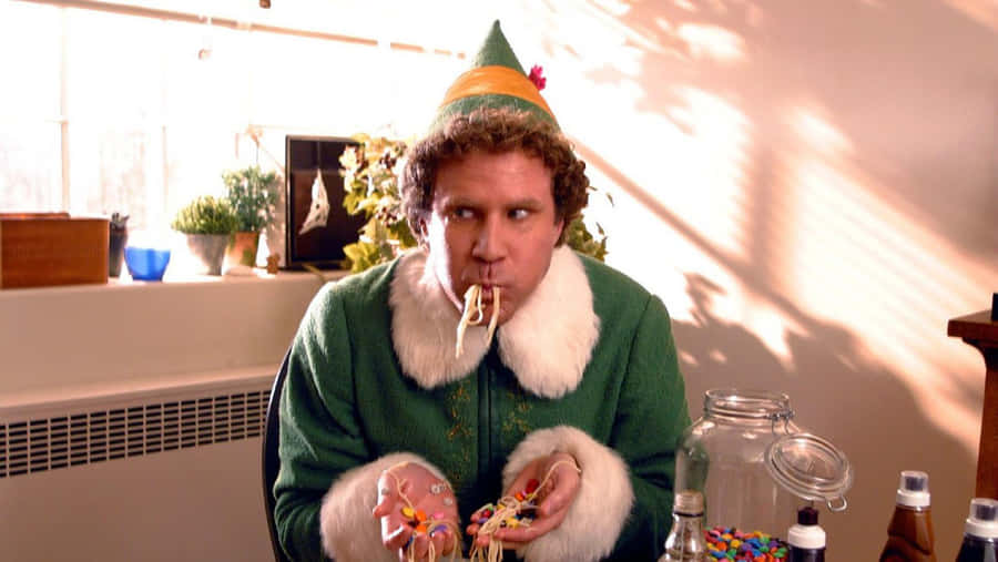 Buddy The Elf, Celebrating The Christmas Season In The North Pole Wallpaper