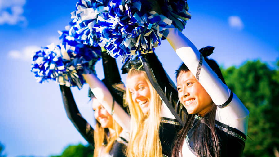 Cheerleadersin Action Wallpaper