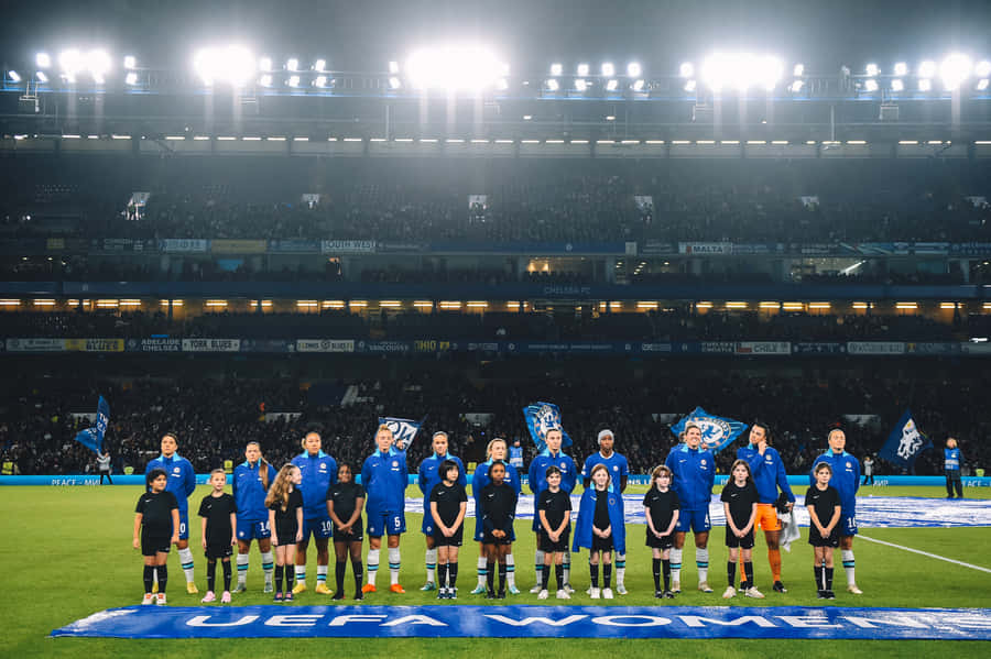 Chelsea Women's Team Pose For A Photo At The Stadium Wallpaper