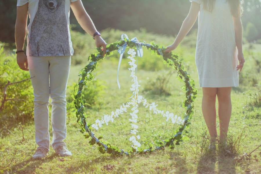 Couple Hands Floral Peace Sign Wallpaper