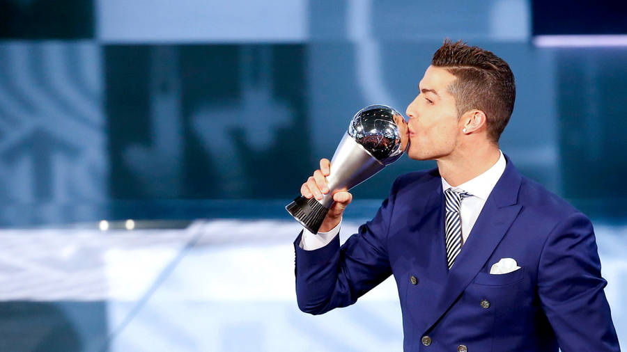 Download free Cr7 Hd Kissing Trophy Wallpaper - MrWallpaper.com