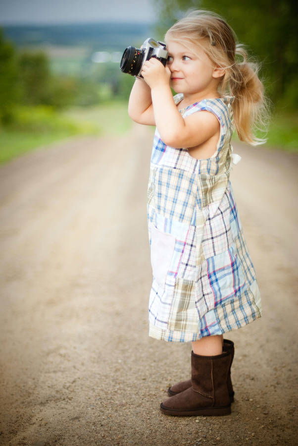 Download free Cute Girl With Boots Taking Photos Wallpaper MrWallpaper