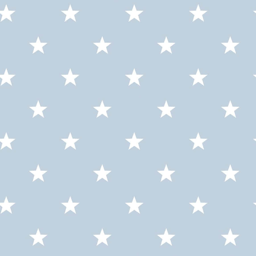 Description- A Beautiful Night Sky Lit Up With A Blanket Of Twinkling Blue Stars Wallpaper