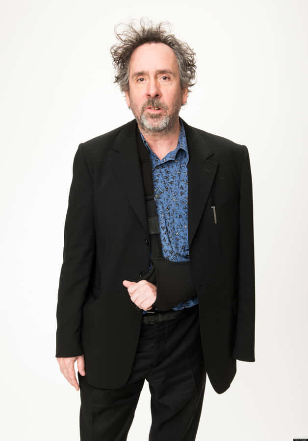 Director Tim Burton At The Premiere Of Alice Through The Looking Glass. Wallpaper