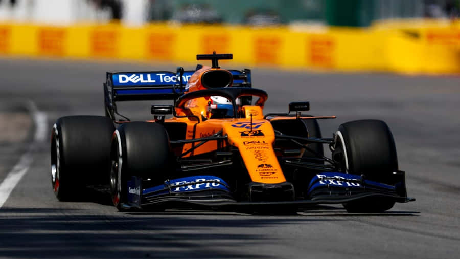 Embracing The Thrill Of Racing With Mclaren Formula 1 Wallpaper