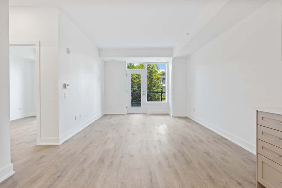 Empty Room With Single Cabinet Wallpaper