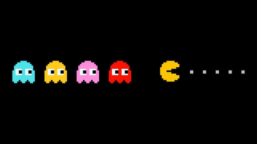 Enjoy Classic Arcade Gaming With Hd Pacman Wallpaper
