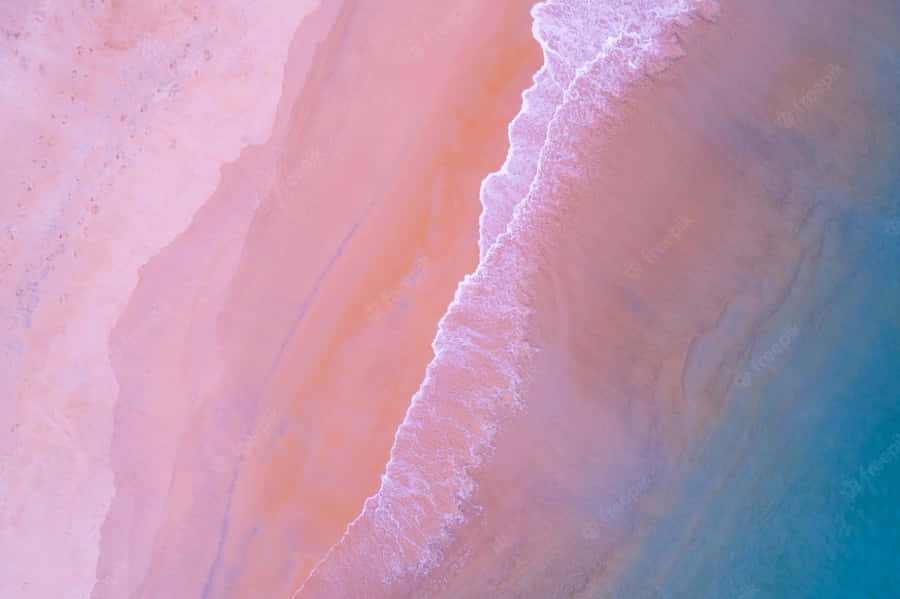 Enjoy The Beautiful, Pastel-colored Sunset At The Beach. Wallpaper