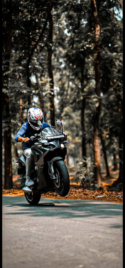 Enjoy The Freedom Of The Open Road With A Beautiful Hd Motorcycle. Wallpaper