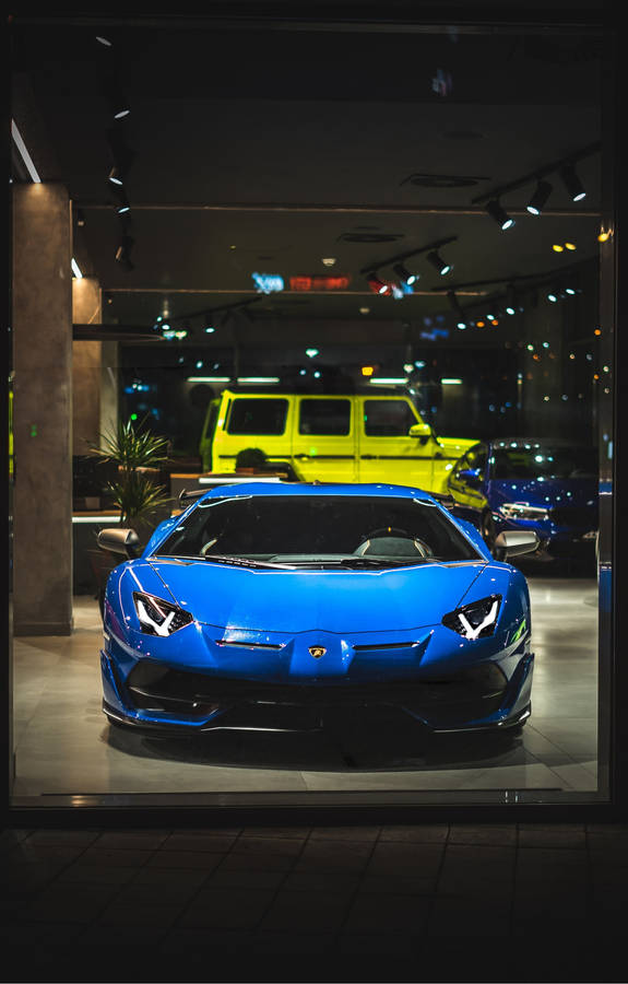 Enjoy The Luxury Of An Unparalleled Driving Experience Wallpaper