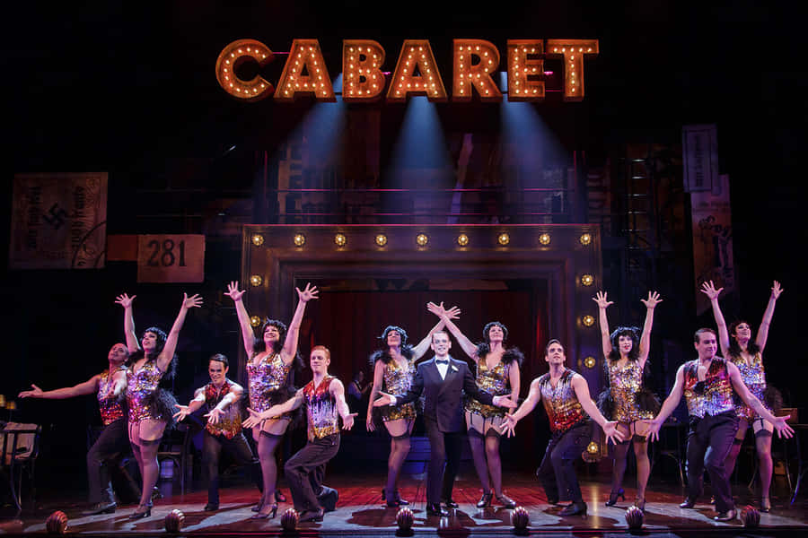 Enjoying A Magical Night At The Musical Theatre Wallpaper