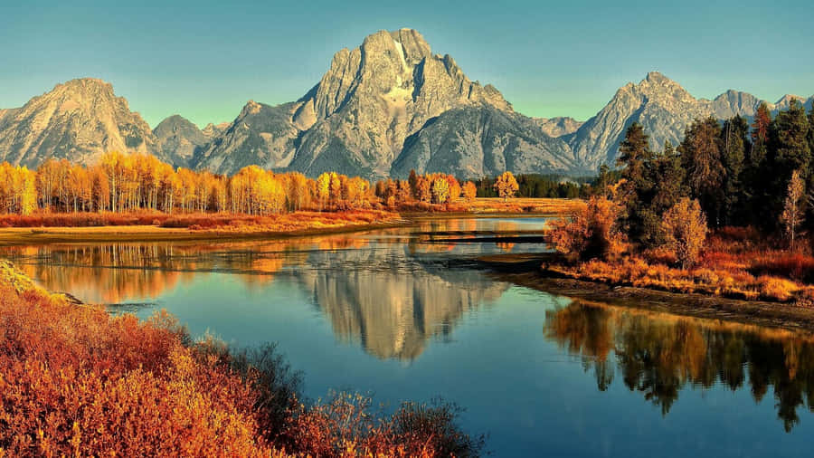 Enjoying The Majestic Views Of The Mountains Wallpaper