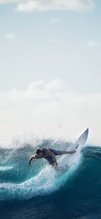 Enjoying The Waves With An Iphone Wallpaper