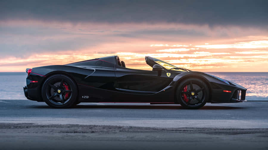 “experience The Thrill Of Racing A Classic Ferrari” Wallpaper