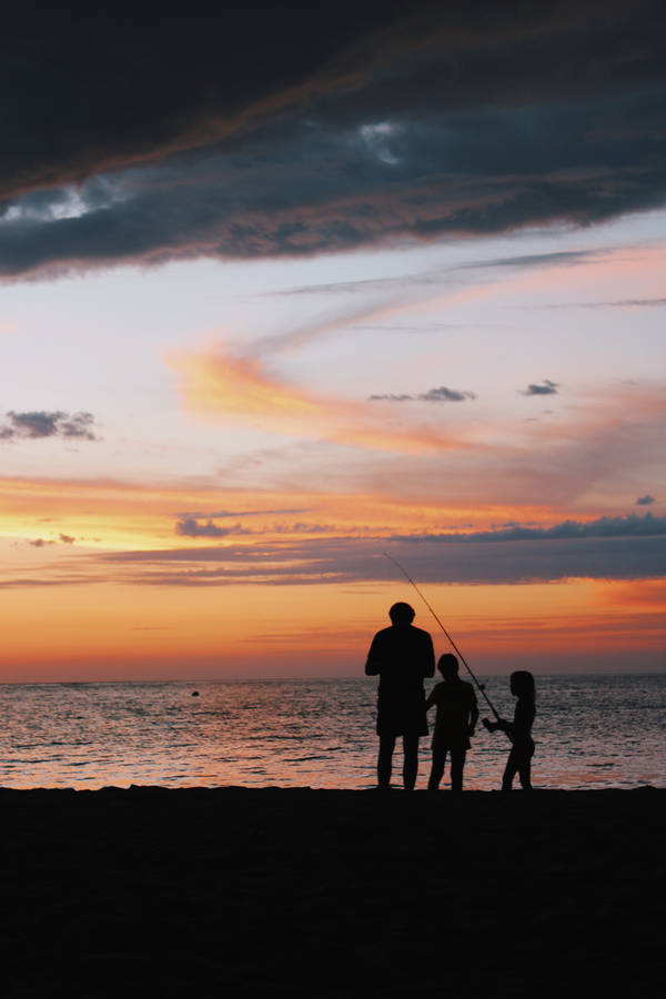 Father And Children Fishing Wallpaper