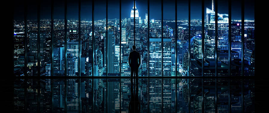 Feel Small Amid A Towering Urban Backdrop. Wallpaper