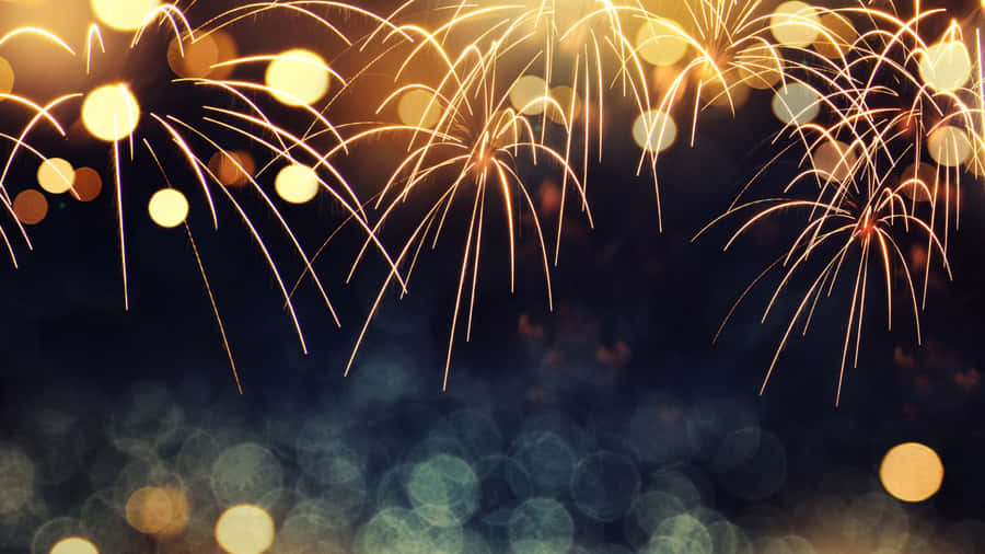 Fireworks On A Dark Background Wallpaper