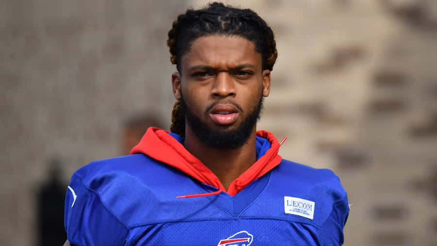 Focused Football Player Portrait Wallpaper