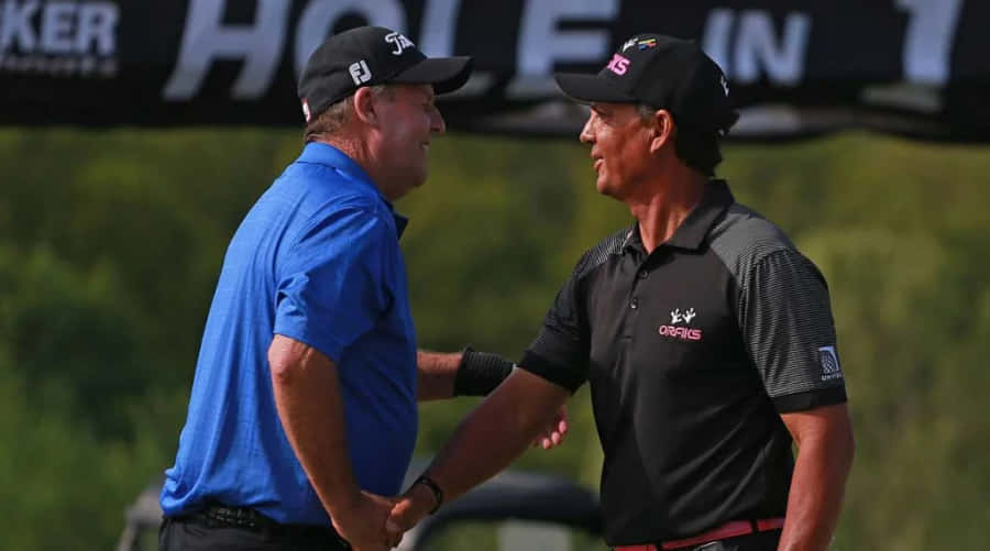 Golfers Handshakeat Tournament Wallpaper