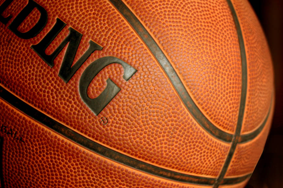 Grip And Spin The Spalding Basketball Wallpaper