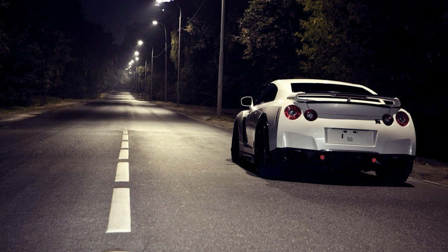 Gt-r Desktop Speeding At Night Wallpaper