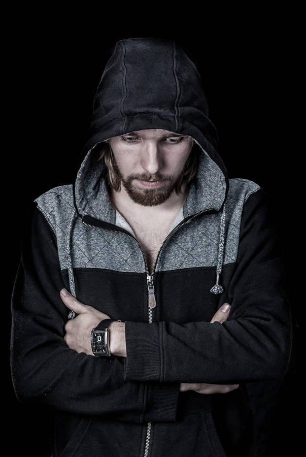 Handsome Boy Wearing Black Hoodie Wallpaper